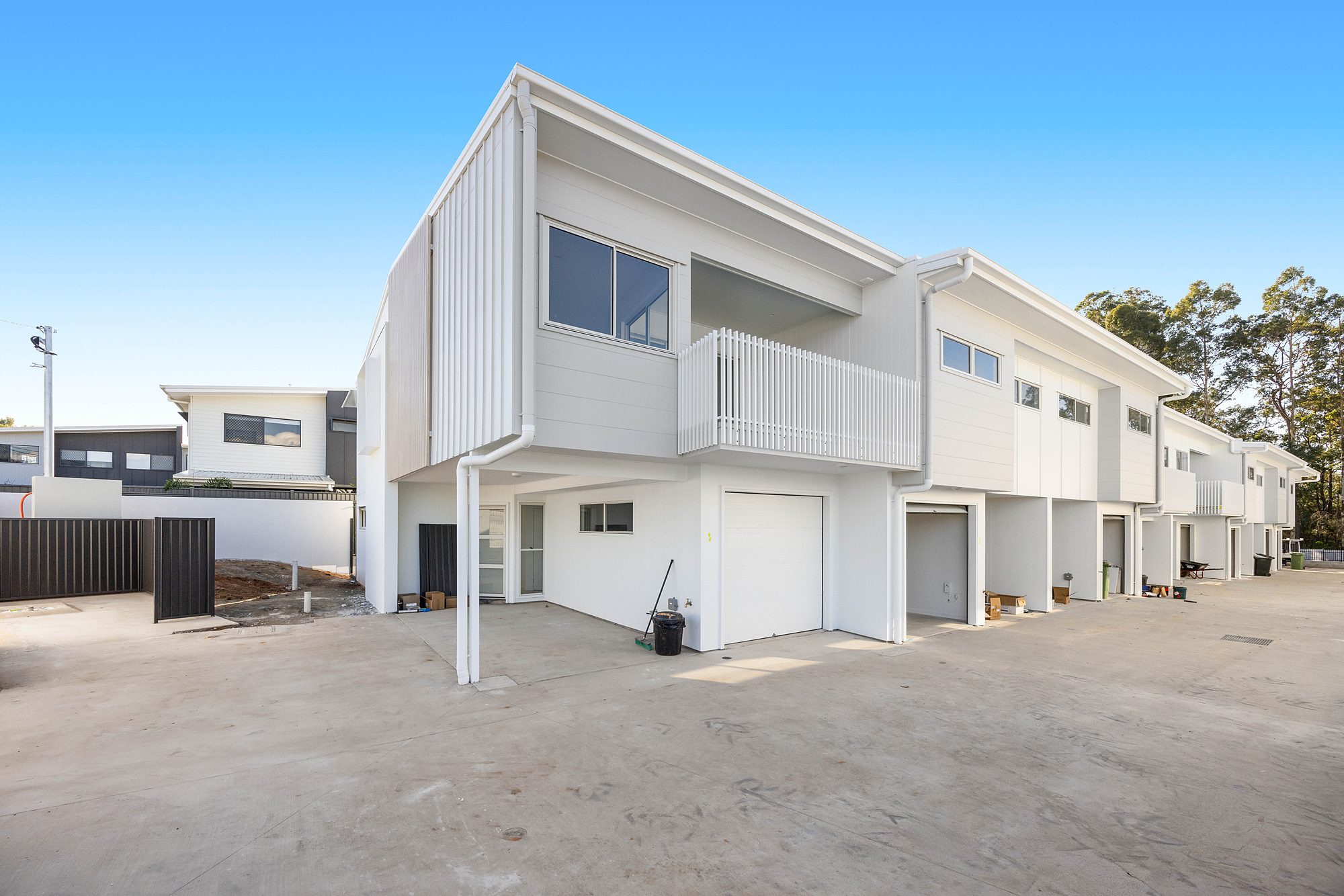 Photo of completed Sanctuary Beerwah townhome exteriors with balconies and garages